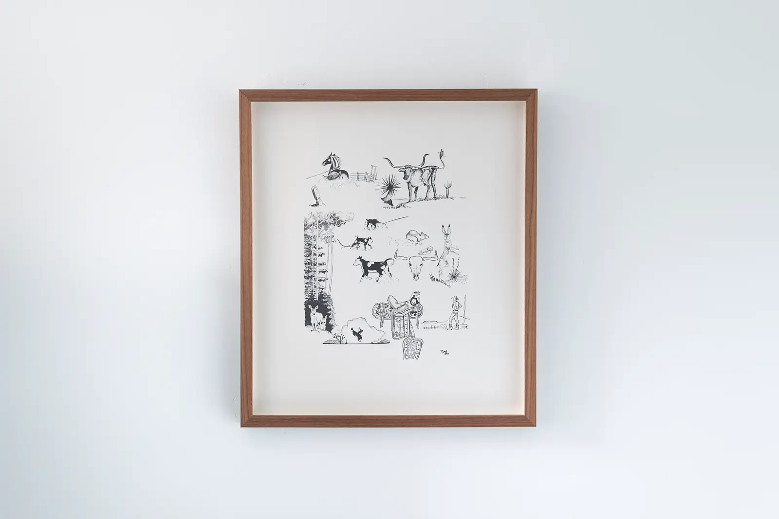 framed pen-and-ink illustration of a Western ranch scene