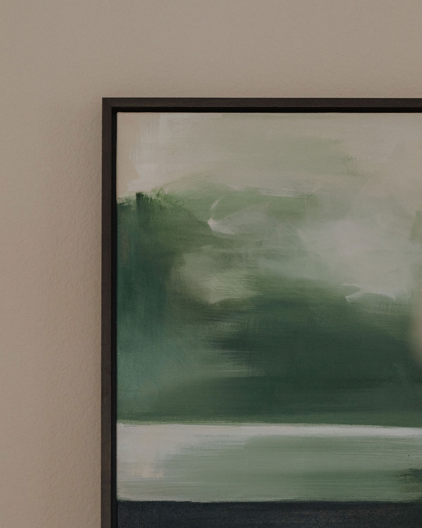 Detail of the painting's upper corner showing layered green and white brushwork